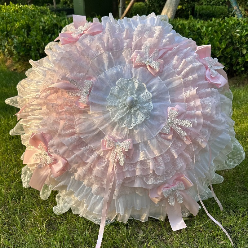 ピンクと白の蝶柄傘。手作りのレース装飾が施され、ティーパーテ - Photography Umbrella のレビューと価格